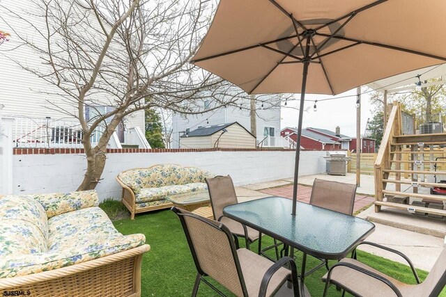 view of patio / terrace featuring an outdoor living space