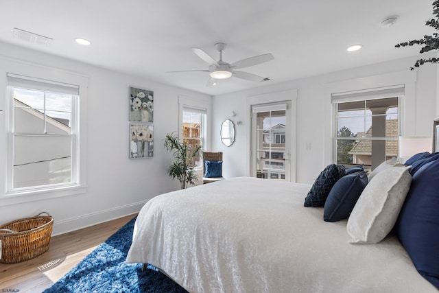 bedroom featuring ceiling fan and wood-type flooring