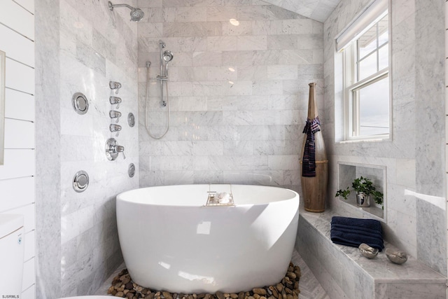 bathroom with independent shower and bath and tile walls