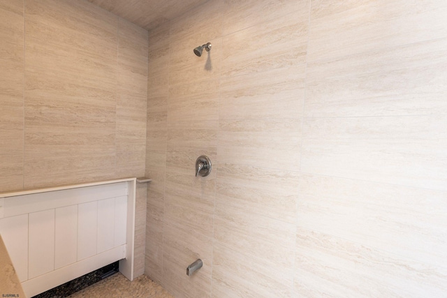 interior space with a tile shower