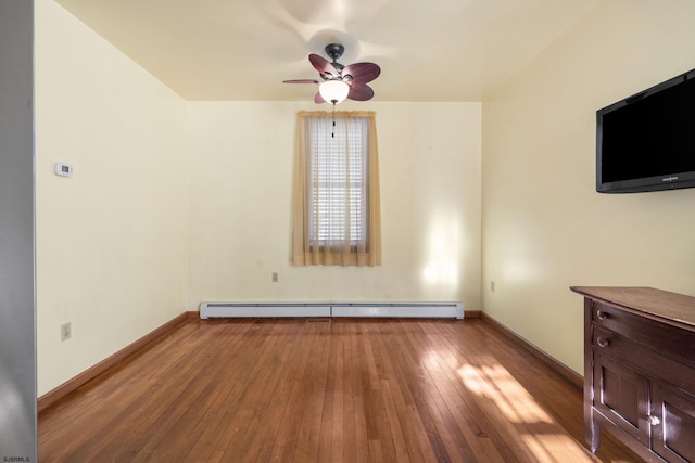 unfurnished living room featuring light hardwood / wood-style floors, ceiling fan, and a baseboard heating unit