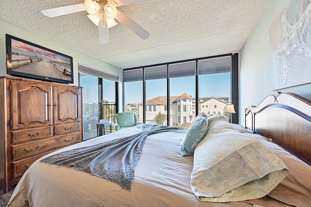 4540 W Brigantine Ave Unit N201, Brigantine, NJ 08203 - bedroom with a textured ceiling, access to outside, and ceiling fan