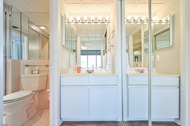 4540 W Brigantine Ave Unit N201, Brigantine, NJ 08203 - full bath with toilet, vanity, a ceiling fan, and a paneled ceiling