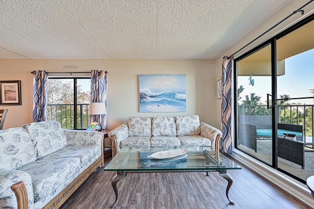 4540 W Brigantine Ave Unit N201, Brigantine, NJ 08203 - living room featuring a textured ceiling and wood finished floors