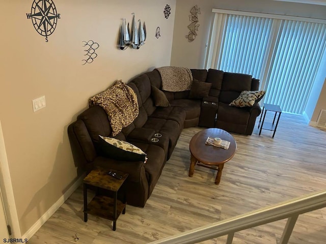 living room with hardwood / wood-style floors