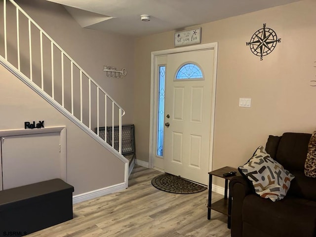 entrance foyer with light hardwood / wood-style flooring