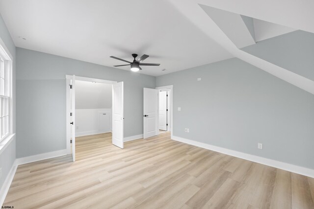 300 N Huntington, Margate, NJ 08402 - unfurnished bedroom with light wood-style flooring, a ceiling fan, and a walk in closet