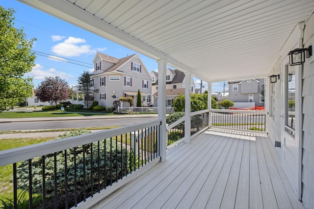 300 N Huntington, Margate, NJ 08402 - wooden deck featuring covered porch and a residential view