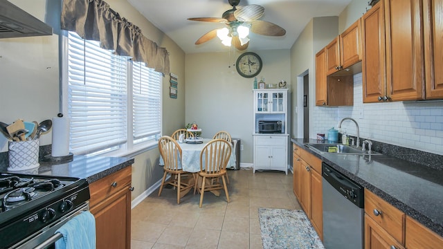 kitchen featuring decorative backsplash, ventilation hood, sink, light tile patterned floors, and dishwasher