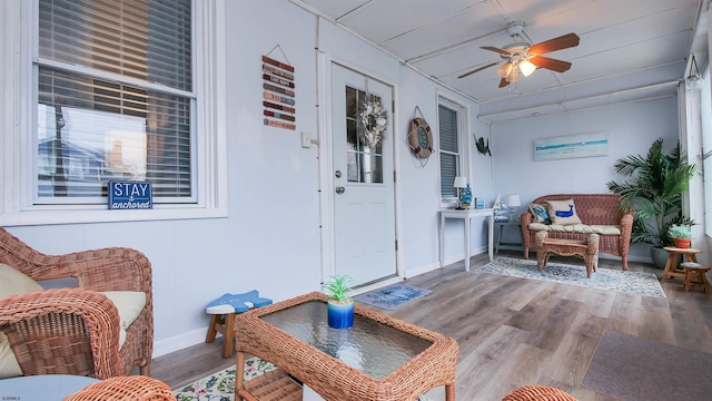 interior space featuring ceiling fan