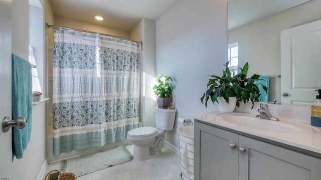 full bathroom featuring shower / tub combo, vanity, and toilet