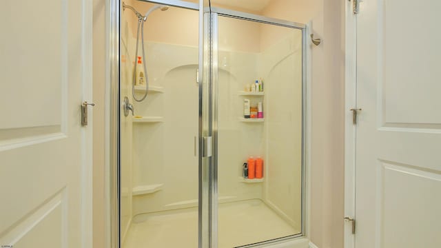 bathroom featuring walk in shower