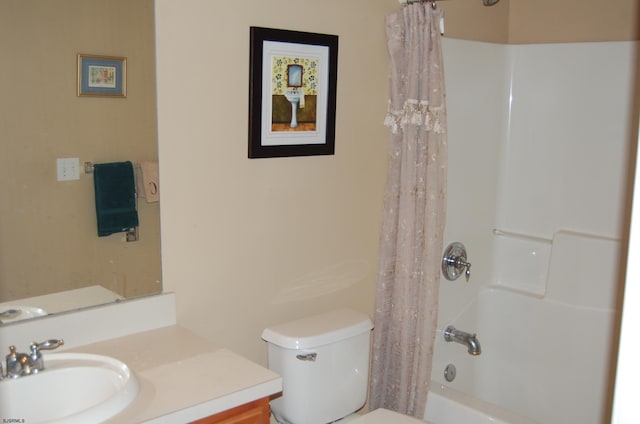 full bathroom featuring vanity, toilet, and shower / bath combo with shower curtain