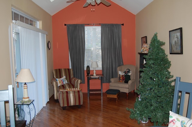 sitting room featuring wood-type flooring, vaulted ceiling, and ceiling fan