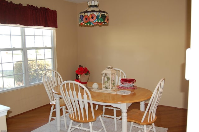 dining area featuring hardwood / wood-style floors