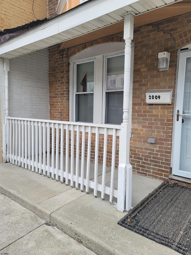 entrance to property with a porch