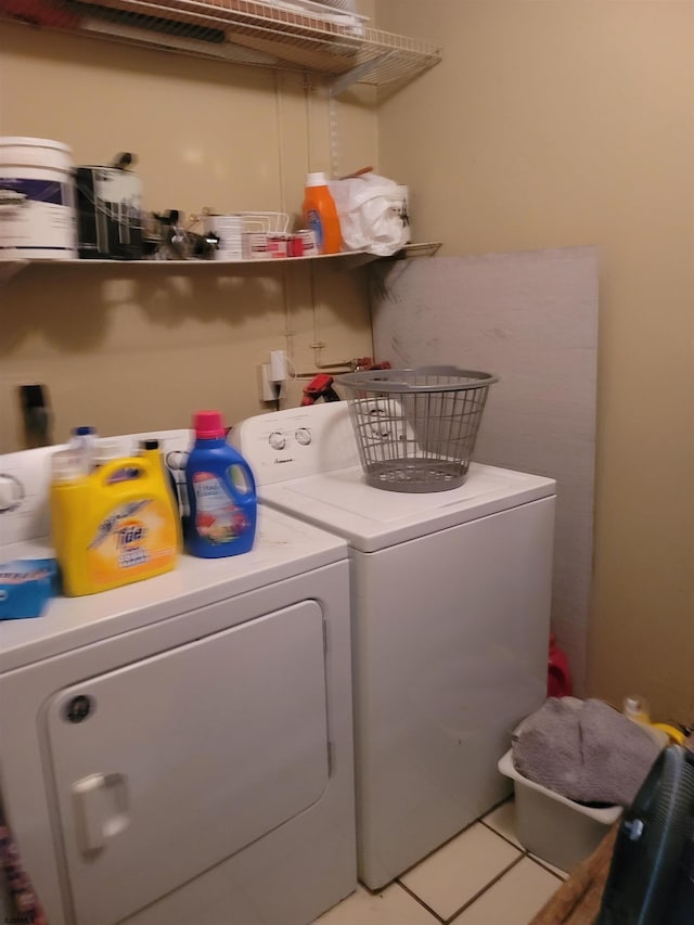 laundry area featuring tile patterned flooring and independent washer and dryer