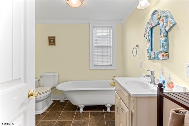 bathroom with crown molding, a bathtub, vanity, and toilet