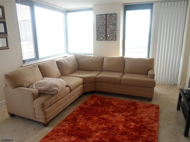 living room featuring a wealth of natural light