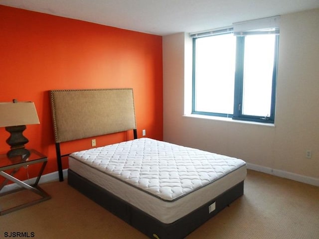 bedroom featuring carpet flooring