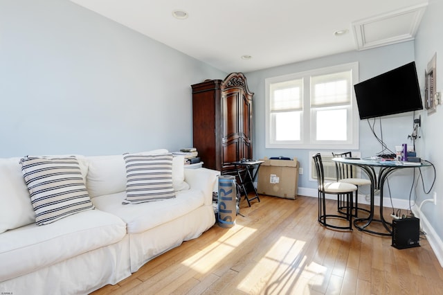 living room with light hardwood / wood-style floors