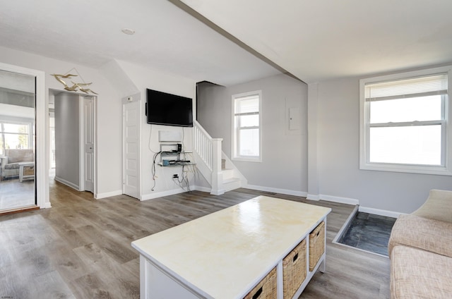 unfurnished living room featuring light wood-type flooring