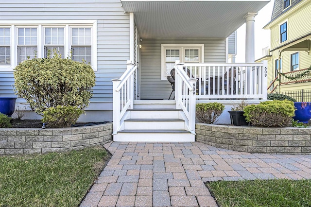 entrance to property with covered porch