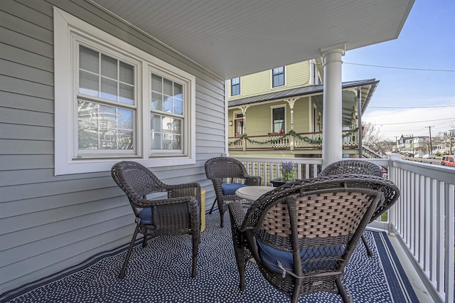 balcony featuring covered porch