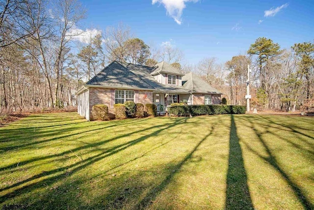 exterior space featuring a front lawn