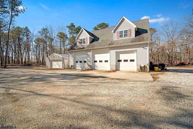 view of property exterior with a garage