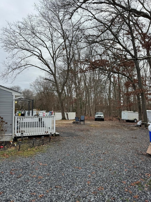 view of yard with a deck