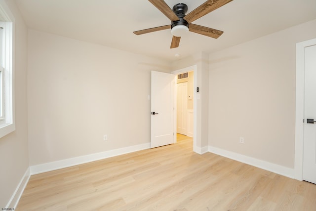 unfurnished bedroom with ceiling fan and light hardwood / wood-style floors