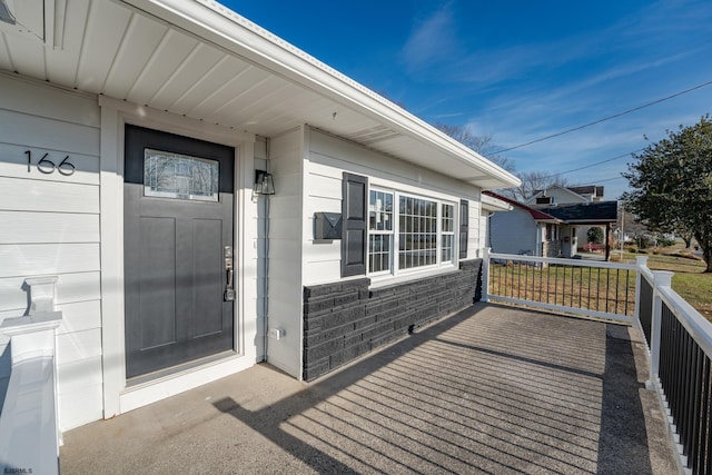 wooden deck featuring covered porch