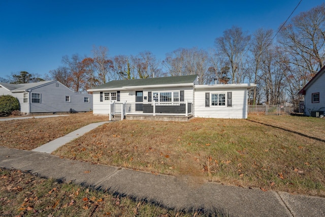 ranch-style house with a front yard