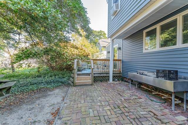 view of patio / terrace featuring a wooden deck