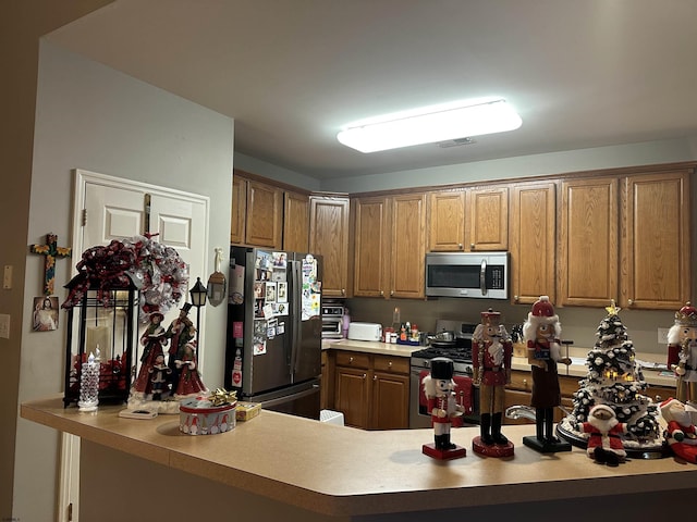 kitchen with appliances with stainless steel finishes