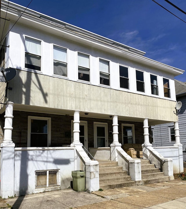 view of front of home featuring covered porch