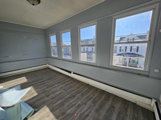 unfurnished room with dark wood-type flooring