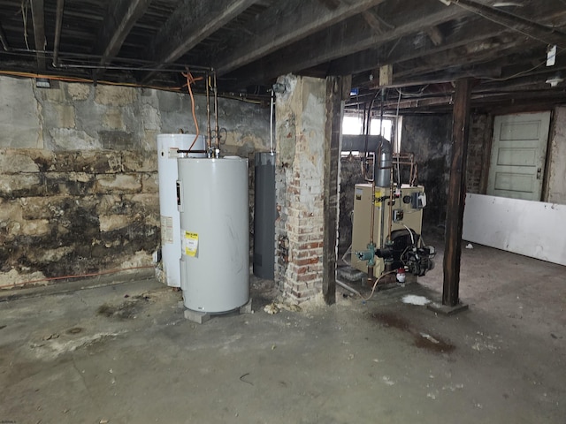 basement featuring gas water heater and water heater