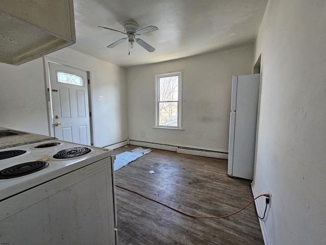 kitchen with ceiling fan, dark hardwood / wood-style flooring, exhaust hood, and white appliances