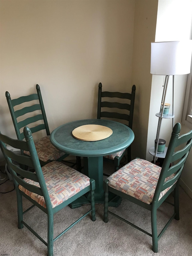 view of carpeted dining room