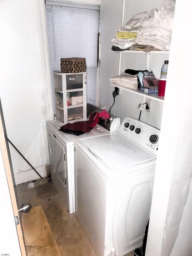 laundry area featuring washing machine and dryer