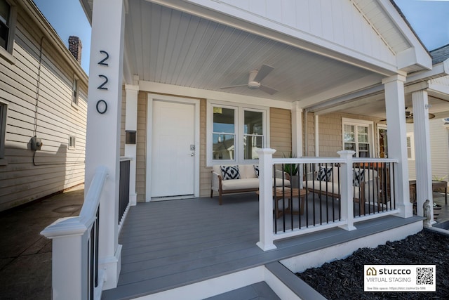 wooden deck with ceiling fan and a porch