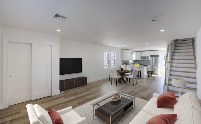 living room featuring light hardwood / wood-style flooring