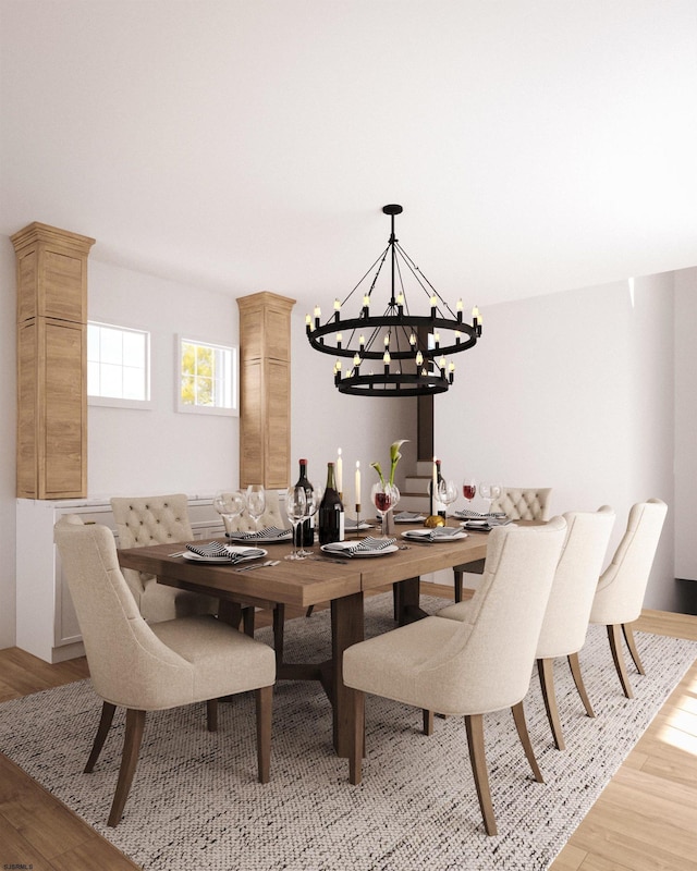 dining space featuring light hardwood / wood-style flooring and a notable chandelier