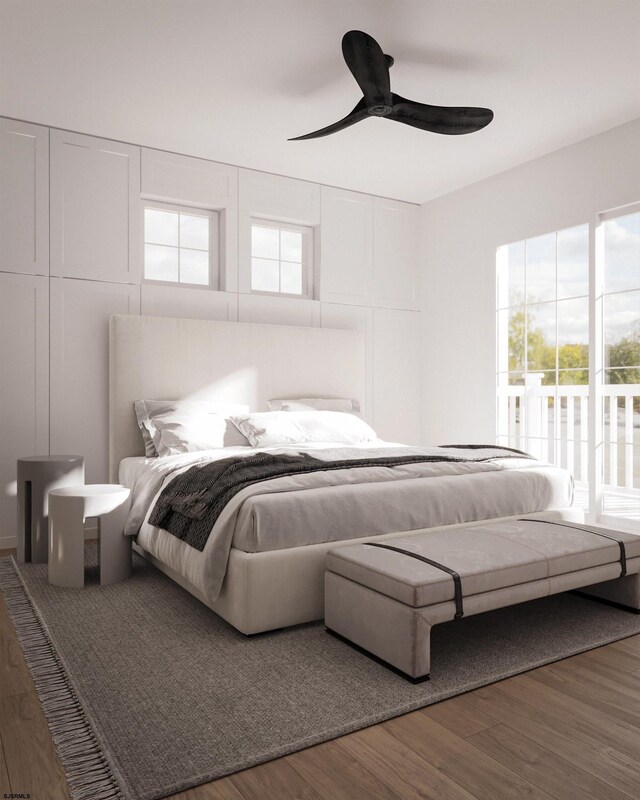 bedroom with dark hardwood / wood-style flooring and ceiling fan