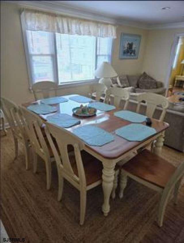 dining room with hardwood / wood-style flooring