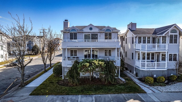 view of front of home with a balcony