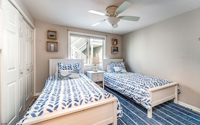 bedroom with ceiling fan, carpet floors, and a closet