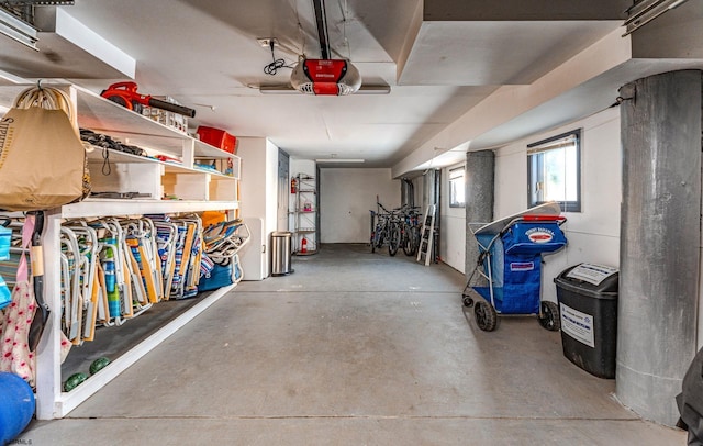 garage featuring a garage door opener